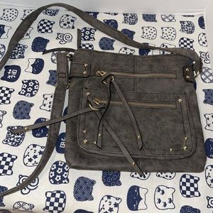Small gray cross body bag with zippers